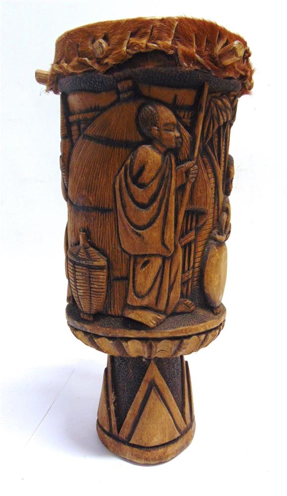 ETHNOGRAPHICA / TRIBAL ART - AN AFRICAN CARVED WOOD & SKIN FLOOR DRUM 20th century, the sides - Image 2 of 2