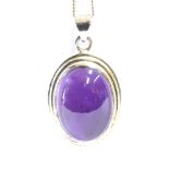 AMETHYST CABOCHON SET SILVER PENDANT Bezel set oval amethyst cabochon, approx 24.7 x 18.1 x 9.5mm,