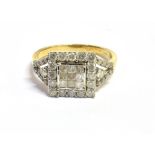 9CT GOLD & DIAMOND RING 11.8mm square head, with central bezel and grain set princess and