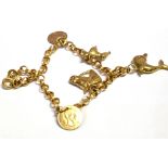 9CT GOLD CHARM BRACELET 18cm long, engraved belcher link chain, with five 9ct gold charms, clasp