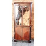 AN INLAID MAHOGANY STANDING CORNER CUPBOARD the upper section with a pair of astragal glazed doors