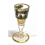 SHOOTING - A 19TH CENTURY WINE GLASS probably Bohemian, painted with a hare shooting scene and