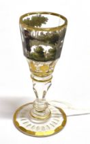 SHOOTING - A 19TH CENTURY WINE GLASS probably Bohemian, painted with a hare shooting scene and