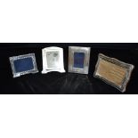 ASSORTED SILVER PICTURE FRAMES Four silver mounted rectangular frames, one Art Deco, hallmarked