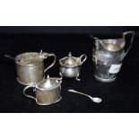 ANTIQUE SILVER MUSTARD POTS & CREAM JUG Three silver lidded mustard pots with blue glass liners, two