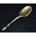 EARLY DUTCH SILVER CHRISTENING SPOON 17cm long, with embossed handle and finial, reverse of the bowl