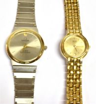 OMEGA & SEIKO QUARTZ WRISTWATCHES Omega quartz, 32.0mm round case, silvered dial & gold hands with