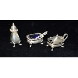 STERLING SILVER CONDIMENT WARE To include a blue glass lined salt and mustard dish with spoons and a