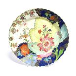 A CHINESE EXPORT 'TOBACCO LEAF' PATTERN PLATE with typical floral enamelled decoration within a