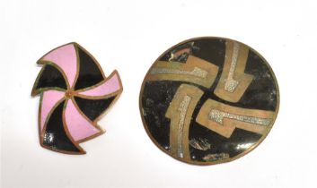 JOHN LEMAN ENAMEL BROOCHES CIRCA 1970 Two copper and enamel brooches by renowned Scottish designer