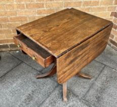 A VICTORIAN MAHOGANY PEMBROKE TABLE with single drawer raised on turned pedestal with four out swept