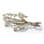 GOLD & DIAMOND LILY OF THE VALLEY BROOCH 4.5cm long, grain set brooch, testing as 18ct white gold,