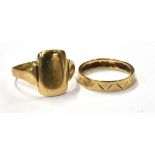 TWO 9CT GOLD RINGS A rectangular shield shaped signet ring and a chevron engraved band. Both