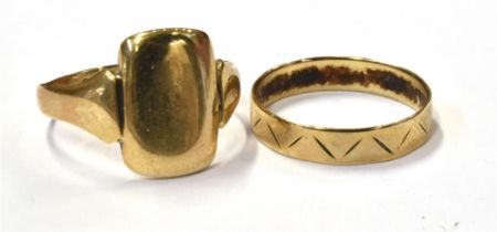 TWO 9CT GOLD RINGS A rectangular shield shaped signet ring and a chevron engraved band. Both