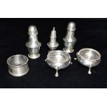 ASSORTED ANTIQUE SILVER CONDIMENT WARE To include a pair of pad foot salts (minus liners), a pair of