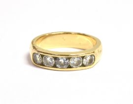 14CT GOLD & DIAMOND ETERNITY RING 4.6mm wide channel set head with five round brilliant cut