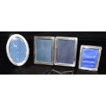 ASSORTED SMALL SILVER PICTURE FRAMES Silver mounted frames, to include three rectangular and one