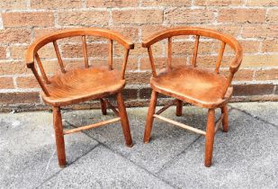 A PAIR OF VICTORIAN CHILDREN'S CHAIRS the hoop backs with spindle supports, the four splayed legs