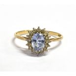 CEYLONESE SAPPHIRE & DIAMOND RING Central oval mixed cut 'ceylonese' sapphire, estimated 1.5 carats,