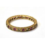 9CT GOLD RUBY & WHITE SAPPHIRE ETERNITY Fully grain set eternity ring, with alternating round