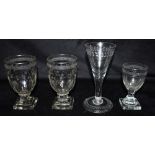 AN ENGRAVED WINE GLASSearly 19th century, the base with a fold-over foot and pontil mark; and