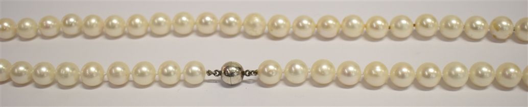 OPERA LENGTH CULTURED PEARL NECKLACE 36 inches long, 84 x 9.4-10.2mm white cultured pearls, round/