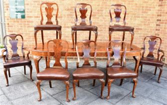 A BURR WALNUT EXTENDING DINING TABLE on cabriole supports, with two additional leaves, 243cm long