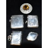 ASSORTED VESTA CASES & CELTIC BROOCH Three finely engraved and chased vesta cases, with pendant bale
