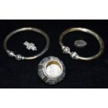 VARIOUS SILVER ITEMS To include two Mogul style bangles with lotus bud finials, a domed lid embossed