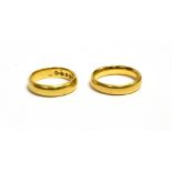 TWO 22CT GOLD WEDDING BANDS One 4.4mm wide, ring size K, hallmarked Sheffield 1874, one 4.0mm