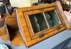 A GEORGE III STYLE HANGING CORNER CABINET