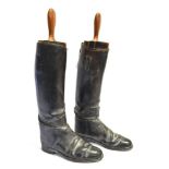 A PAIR OF BLACK LEATHER RIDING BOOTS complete with trees, size 4/5