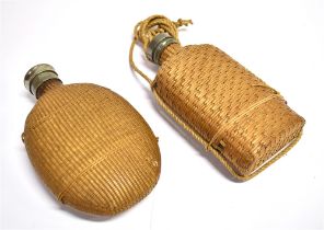 TWO FLASKS WITH REED COVERING