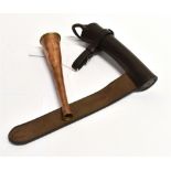A COPPER HUNTING HORN length 19cm with leather holder for saddle mounting