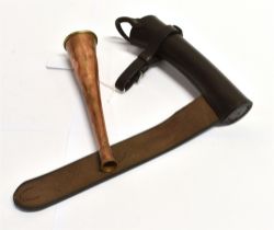 A COPPER HUNTING HORN length 19cm with leather holder for saddle mounting