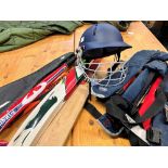 TWO CRICKET BATS a cricket helmet, two hockey sticks, a squash racket, in case, and three KruXS