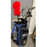A PRO DRIVE CANVAS GOLF BAG and fifteen assorted golf clubs