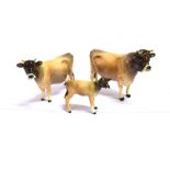 BESWICK CATTLE JERSEY FAMILY comprising bull 'Dunsley Coyboy'; cow 'Newton Tinkle' & calf (3)