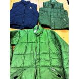 A GREEN 'PUFFA' LONG SLEEVE GILET XL, a green 'Puffa' gilet, L, and a blue 'La Nava' gilet (3)