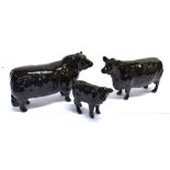 BESWICK CATTLE ABERDEEN ANGUS FAMILY comprising bull; cow and calf; Note: The bull & cow, both