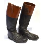 A PAIR OF BLACK LEATHER RIDING BOOTS with tan tops, size 7