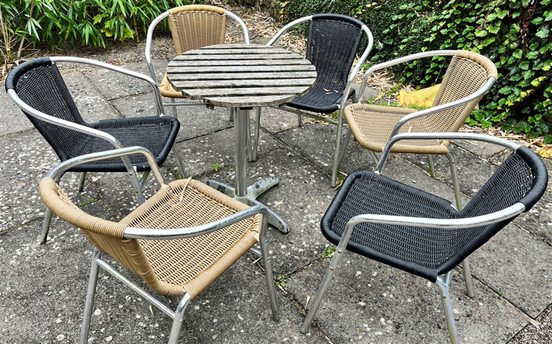 CIRCULAR GARDEN TABLE AND SIX CHAIRS