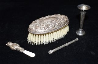 VARIOUS STERLING SILVER ITEMS Silver mounted scroll embossed hairbrush, small bud vase,