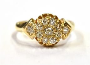 ESTATE CUT DIAMOND 18CT GOLD RING A belcher claw and grain set floral cluster head, set with old