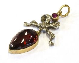 ANTIQUE FRENCH GEM SET PENDANT Featuring a pear shaped, cabochon pyrope garnet, approx 14.8 x 9.2mm,