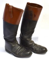 A PAIR OF BLACK LEATHER RIDING BOOTS with tan tops, size 7