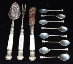 SCOTTISH STERLING SILVER TEASPOONS A set of eight with thistle topped terminals, hallmarked