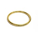 HEAVY GOLD PLATED BANGLE 7cm internal diameter, 5.9mm wide of rounded hollow form.