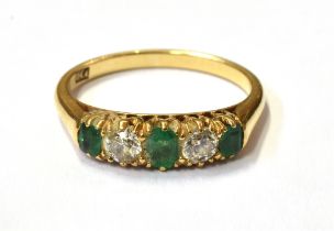 EMERALD & ESTATE CUT DIAMOND FIVE STONE 18ct gold belcher claw set ring, with two old European cut