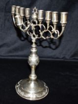 GEORGE V STERLING SILVER MENORAH Stands 32cm high, with 9 branches above baluster shaped pedestal